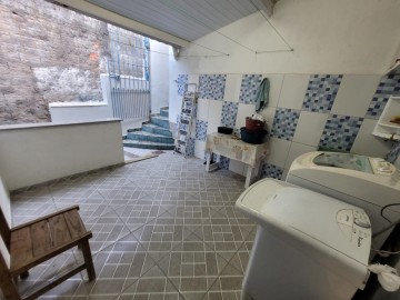 Acesso a lavanderia por dentro da casa